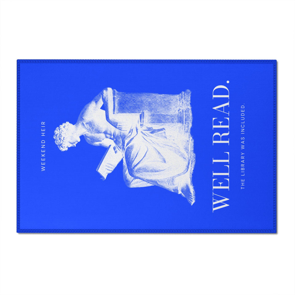 Studio | Well Read Rug, white reader engraving on royal blue